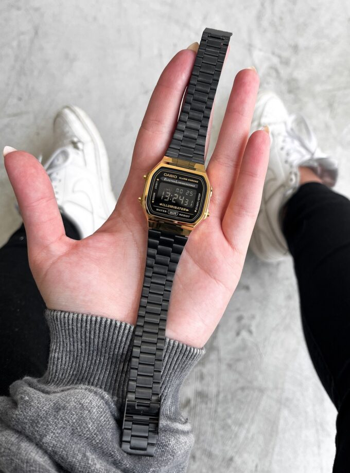 Montre CASIO Unisexe - Bracelet Noir En Acier Inoxydable - Résistante à l'eau - 12 Mois De Garantie - A168WEGB-1BDF