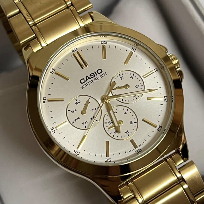 Montre CASIO Homme - Bracelet DoRée En Acier Inoxydable - Cadran Blanc - 12 Mois De Garantie - MTP-V300G-7AUDF