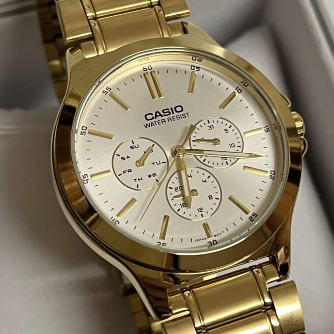 Montre CASIO Homme - Bracelet DoRée En Acier Inoxydable - Cadran Blanc - 12 Mois De Garantie - MTP-V300G-7AUDF