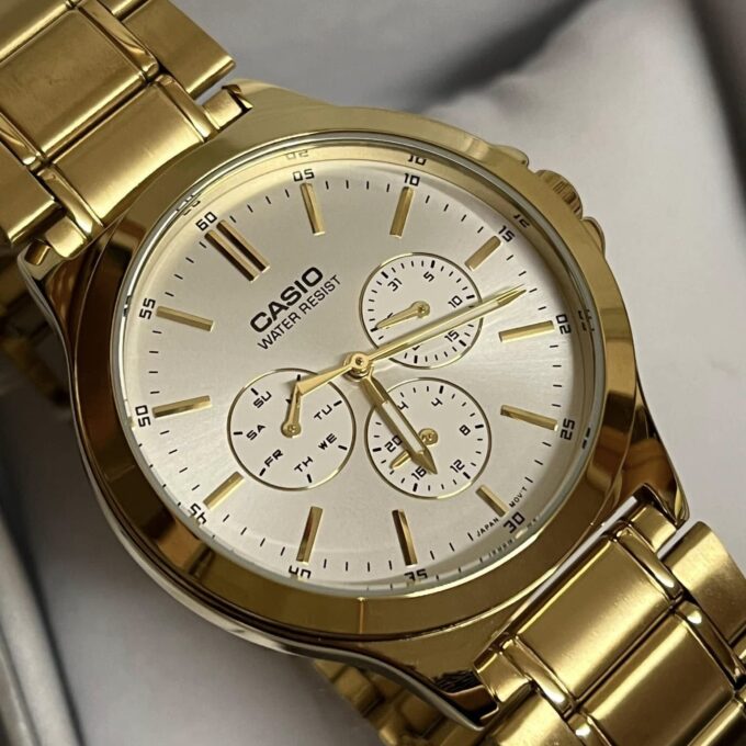 Montre CASIO Homme - Bracelet DoRée En Acier Inoxydable - Cadran Blanc - 12 Mois De Garantie - MTP-V300G-7AUDF