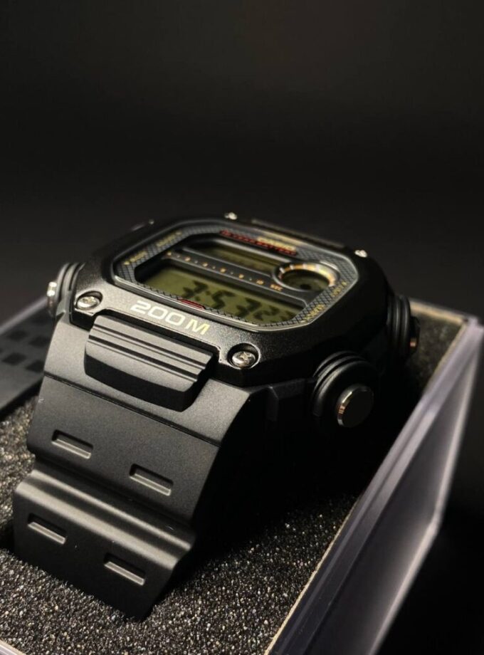 Montre CASIO Homme - DW-291H-9AVDF - Bracelet Noir En Résine - Résistante à l'eau - 12 Mois De Garantie