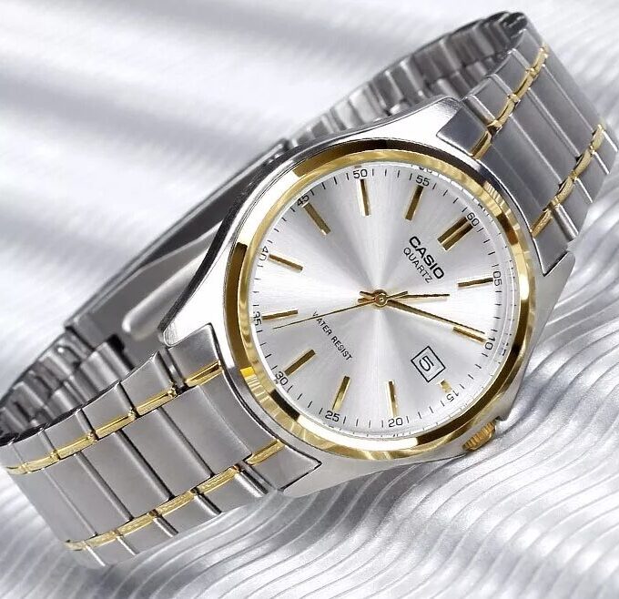 Montre Casio Homme - Bracelet Gris/Dorée En Acier Inoxydable - Cadran Blanc - 12 Mois De Garantie - Mtp-1183G-7Adf