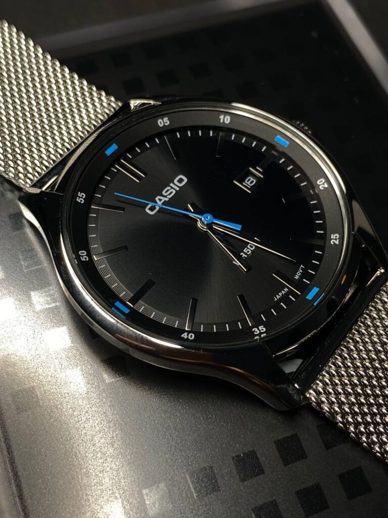 montre homme casio Élégance classique avec cadran noir et bracelet en acier mtp e710m 1avdf