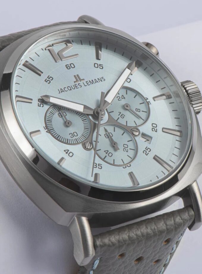 Montre Homme Jacques Lemans Collection Lugano 1-1645 - Chronographe Acier Inoxydable Massif - Diamètre 46 mm - Affichage Analogique Index - Bracelet en Cuir Gris/Bleu Surpiqûres - Mouvement TMI VD53C 14 - Etanche jusqu'à 10 ATM - 1-1645S