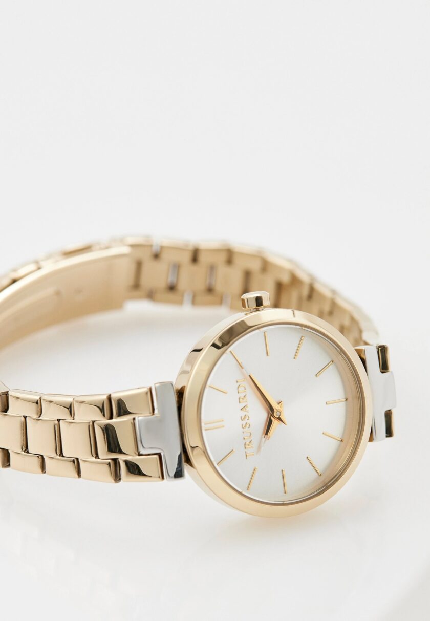 montre femme trussardi loud acier inoxydable, cadran rond blanc 30mm, bracelet bi couleur doré, résistante 50 mètres r2453164507