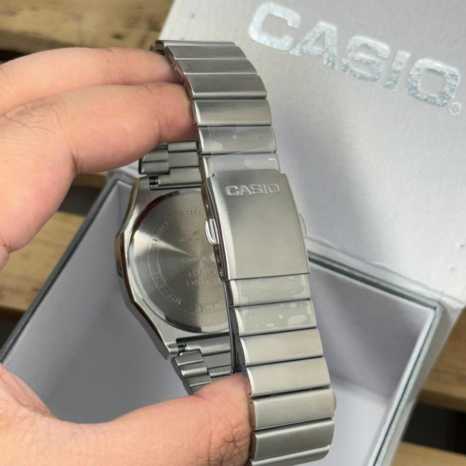 montre homme casio mtp e735d 7av acier inoxydable, cadran argenté, affichage jour/date, bracelet métal montres boutique aïwatch