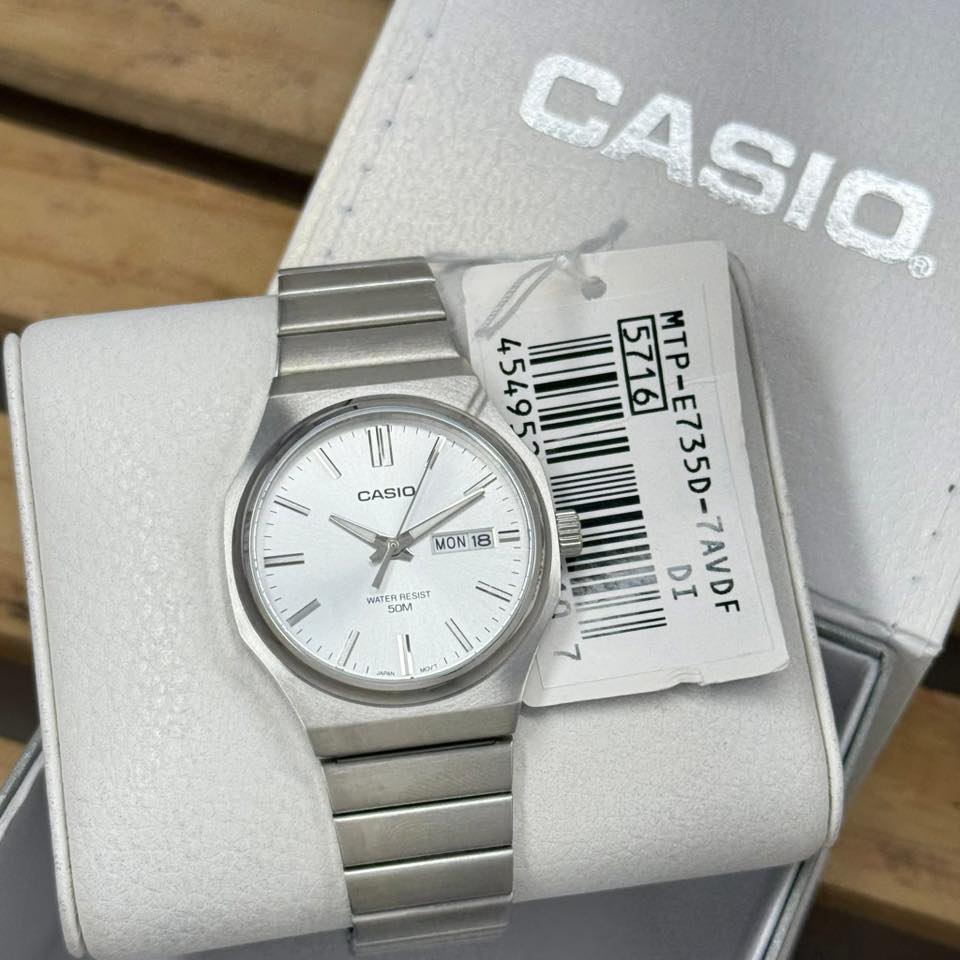 montre homme casio mtp e735d 7av acier inoxydable, cadran argenté, affichage jour/date, bracelet métal montres boutique aïwatch
