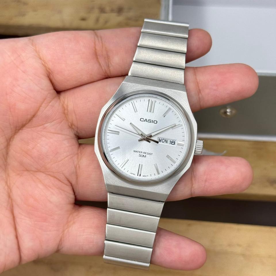 montre homme casio mtp e735d 7av acier inoxydable, cadran argenté, affichage jour/date, bracelet métal montres boutique aïwatch