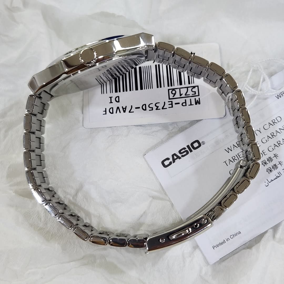 montre homme casio mtp e735d 7av acier inoxydable, cadran argenté, affichage jour/date, bracelet métal montres boutique aïwatch