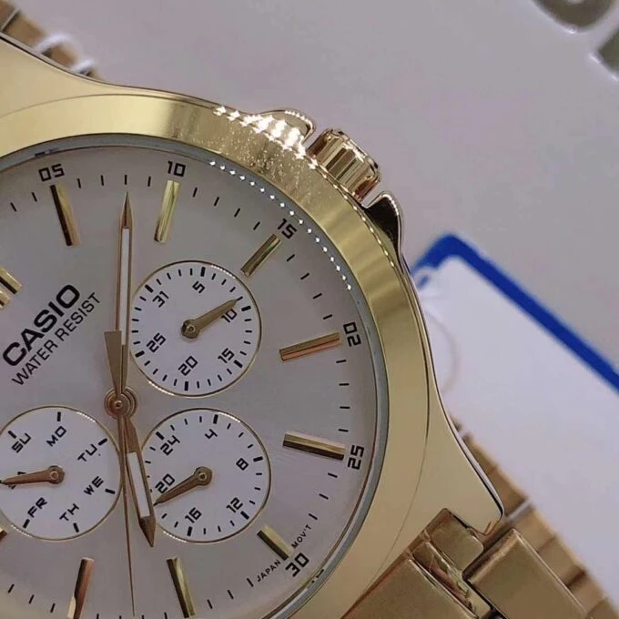 Montre CASIO Homme - Bracelet DoRée En Acier Inoxydable - Cadran Blanc - 12 Mois De Garantie - MTP-V300G-7AUDF