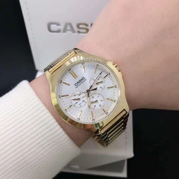 Montre CASIO Homme - Bracelet DoRée En Acier Inoxydable - Cadran Blanc - 12 Mois De Garantie - MTP-V300G-7AUDF