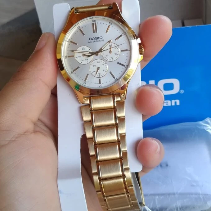 Montre CASIO Homme - Bracelet DoRée En Acier Inoxydable - Cadran Blanc - 12 Mois De Garantie - MTP-V300G-7AUDF