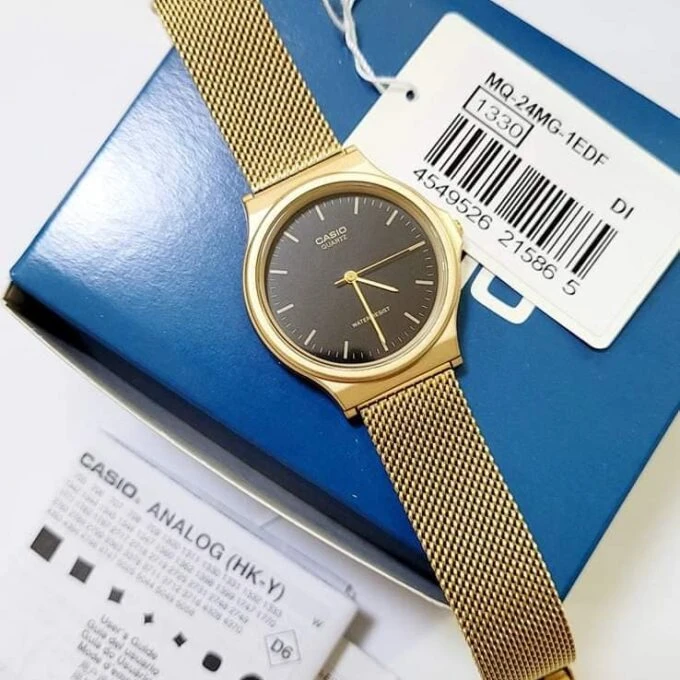 Montre Casio Homme - Bracelet Dorée En Resine -Boitier En Resine - Résistante À L'Eau - 12 Mois De Garantie - Mq-24Mg-1Edf