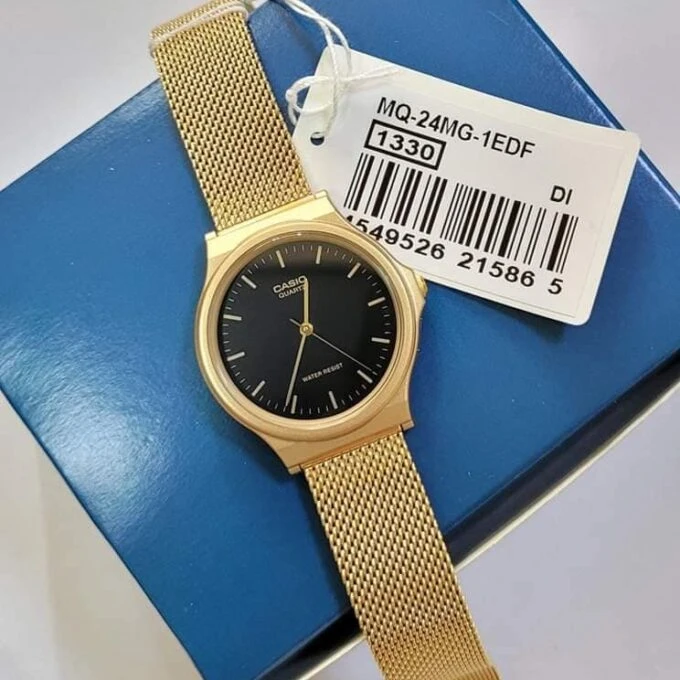 Montre Casio Homme - Bracelet Dorée En Resine -Boitier En Resine - Résistante À L'Eau - 12 Mois De Garantie - Mq-24Mg-1Edf