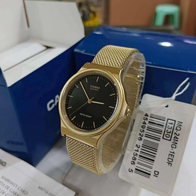 Montre Casio Homme - Bracelet Dorée En Resine -Boitier En Resine - Résistante À L'Eau - 12 Mois De Garantie - Mq-24Mg-1Edf