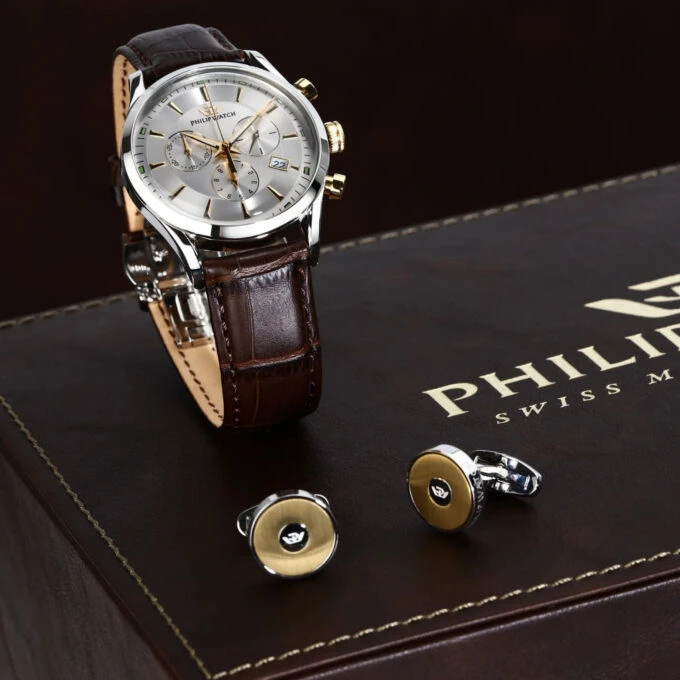 Montre Homme Sunray RONDA 5040D chronographe 1/10s, date, acier inoxydable 39mm, boutons dorés, cadran blanc vintage, bracelet cuir marron crocodile, étanche 30m, coffret boutons de manchette, R8271908011